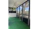 Screened lanai with artificial turf and scenic views at 2593 Countryside Blvd # 7213, Clearwater, FL 33761