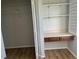 Small home office space with shelving and drawers at 2593 Countryside Blvd # 7213, Clearwater, FL 33761