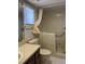 Main bathroom with walk-in shower and updated vanity at 2593 Countryside Blvd # 7213, Clearwater, FL 33761