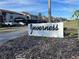 Attractive community entrance sign with landscaping at 2593 Countryside Blvd # 7213, Clearwater, FL 33761