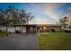 House exterior with covered carport and landscaping at 2609 Highland Ave, Plant City, FL 33563