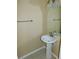 Small bathroom with pedestal sink and mirror at 262 Countryside Key Blvd, Oldsmar, FL 34677