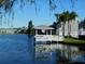 White gazebo on a dock overlooking a community lake at 262 Countryside Key Blvd, Oldsmar, FL 34677