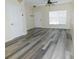 Bright living room featuring wood-look vinyl flooring at 262 Countryside Key Blvd, Oldsmar, FL 34677