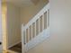 White staircase with wood-look vinyl treads at 262 Countryside Key Blvd, Oldsmar, FL 34677
