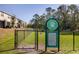 Community dog park entrance with rules posted at 3000 Jacob Crossing Ln, Holiday, FL 34691