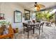 Covered patio with seating area and a view of the pool at 3003 Longbrooke Way, Clearwater, FL 33760