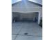 Garage with space for two cars and storage at 3050 Forrest Plum Ct, Zephyrhills, FL 33540