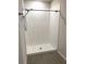 Large walk-in shower with white tile at 3050 Forrest Plum Ct, Zephyrhills, FL 33540