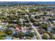 Aerial view showing home's location in a residential neighborhood at 391 Meravan Ct, Palm Harbor, FL 34683