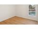 Bedroom with pool view and light wood flooring at 3911 King Dr, Brandon, FL 33511