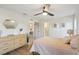 Bedroom with light pink bedding and built-in dresser at 3911 King Dr, Brandon, FL 33511