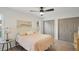 Bright bedroom with double bed, nightstand and large closet at 3911 King Dr, Brandon, FL 33511