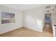 Bedroom with wood flooring, and access to another room at 3911 King Dr, Brandon, FL 33511