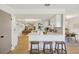 Modern kitchen with white cabinets, quartz countertops, and stainless steel appliances at 3911 King Dr, Brandon, FL 33511