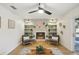 Living room with fireplace, built-in shelving, and sliding doors at 3911 King Dr, Brandon, FL 33511