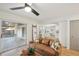 Living room with leather couch and view of kitchen at 3911 King Dr, Brandon, FL 33511