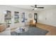 Bright and airy living room with hardwood floors and large windows at 3911 King Dr, Brandon, FL 33511
