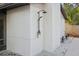 Modern outdoor shower with black fixtures at 3911 King Dr, Brandon, FL 33511