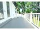 A wide angle shot showing a modern balcony with white railings, offering a tranquil space for relaxation at 408 E Hanlon St, Tampa, FL 33604