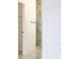 Bathroom featuring a glass shower at 408 E Hanlon St, Tampa, FL 33604