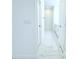 Bright hallway featuring marble-look tile flooring at 408 E Hanlon St, Tampa, FL 33604