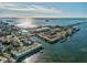 Panoramic aerial view, showing the neighborhood waterways, docks, marinas, and city center at 464 N Paula Dr # 322, Dunedin, FL 34698