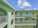 The exterior offers multiple balconies for residents to soak up the sun and enjoy the surrounding views at 464 N Paula Dr # 322, Dunedin, FL 34698