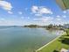Stunning water view from the property overlooking the bay and lush landscaping at 464 N Paula Dr # 322, Dunedin, FL 34698