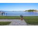 Stunning waterfront views with private dock access, a serene escape from city life with waterfront activities at 464 N Paula Dr # 322, Dunedin, FL 34698