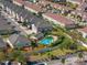 Aerial view of community pool and surrounding townhomes at 5128 6Th N Way, St Petersburg, FL 33703