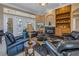 Living room with fireplace and built in shelving at 5264 61St S Ave, St Petersburg, FL 33715