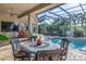 Outdoor patio with round table and chairs, perfect for dining al fresco at 5264 61St S Ave, St Petersburg, FL 33715