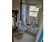 Bathroom under renovation, bathtub and toilet visible at 6606 Sierra Ter, New Port Richey, FL 34652