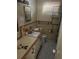 Small bathroom with beige tile and vanity at 7042 Dartmouth N Ave, St Petersburg, FL 33710