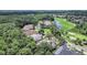 Beautiful aerial view of homes backing up to a golf course and pond in a lush Florida community at 10106 Radcliffe Dr, Tampa, FL 33626