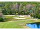 Scenic view of the golf course with lush greenery and trees at 10106 Radcliffe Dr, Tampa, FL 33626