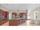 Gourmet kitchen with granite countertops and stainless steel appliances at 10106 Radcliffe Dr, Tampa, FL 33626