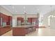 Modern kitchen featuring an island with barstool seating at 10106 Radcliffe Dr, Tampa, FL 33626