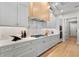 Gourmet kitchen boasts sleek countertops, stainless steel appliances, and custom cabinetry offering ample storage at 10639 Ruffino Ct, Trinity, FL 34655