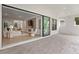 Open-air patio featuring brick flooring, offering seamless transition to indoor living space at 10639 Ruffino Ct, Trinity, FL 34655