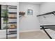 Spacious walk-in closet with shelving, ample storage, and natural light, offering organization and convenience at 10639 Ruffino Ct, Trinity, FL 34655