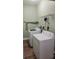 Practical laundry room with full-size white washer and dryer at 143 44Th N Ave, St Petersburg, FL 33703