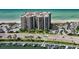 Aerial view of condo building near marina and beach at 1660 Gulf Blvd # 706, Clearwater Beach, FL 33767