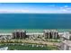 Aerial view of beachfront condo building with ocean views at 1660 Gulf Blvd # 706, Clearwater Beach, FL 33767