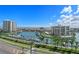 Aerial view of waterfront community with marina and lush landscaping at 1660 Gulf Blvd # 706, Clearwater Beach, FL 33767