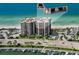 Aerial view of beachfront condo building showcasing oceanfront location at 1660 Gulf Blvd # 706, Clearwater Beach, FL 33767