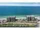 Aerial view of beachfront condo building and ocean at 1660 Gulf Blvd # 706, Clearwater Beach, FL 33767