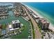 Aerial view of condo building near marina and beach at 1660 Gulf Blvd # 706, Clearwater Beach, FL 33767