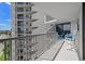 Relaxing balcony with seating and picturesque views at 1660 Gulf Blvd # 706, Clearwater Beach, FL 33767